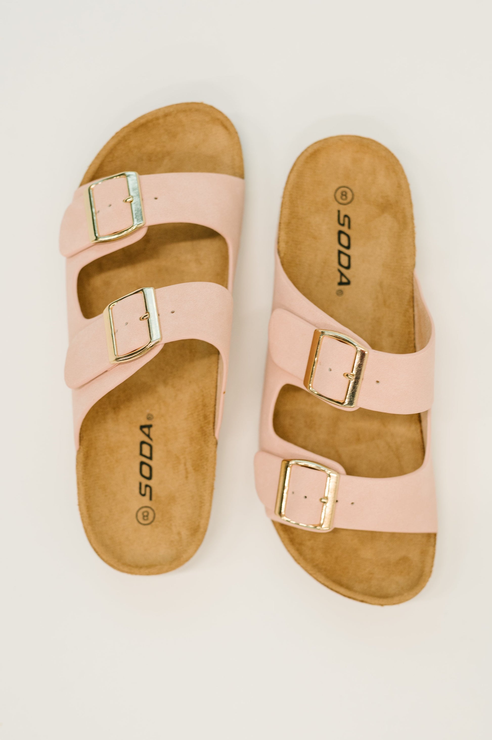 Jete Nubuck Double Buckle Slides in Blush Thread & Co. Boutique, LLC
