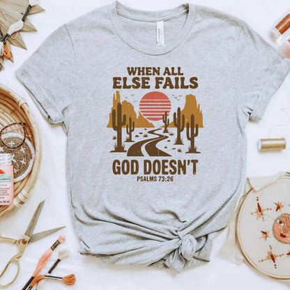 Christian Graphic T-Shirt - “When All Else Fails, God Doesn’t” - Psalms 73:26 Bible Verse Shirt SouthWest Desert Western Boho Joyful Moose